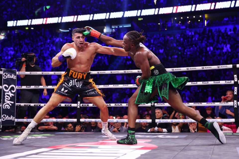 MANCHESTER, ENGLAND - OCTOBER 14: KSI (Olajide Olayinka Williams) and Tommy Fury exchange punches during the Misfits Cruiserweight fight between KSI (Olajide Olayinka Williams) and Tommy Fury at AO Arena on October 14, 2023 in Manchester, England. (Photo by Matt McNulty/Getty Images)