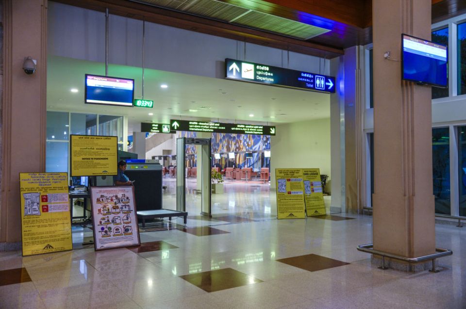Airport security checkpoint with a security scanner.