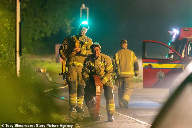 Firefighters are pictured on the scene of a blaze at a former RAF base in Bicester last night