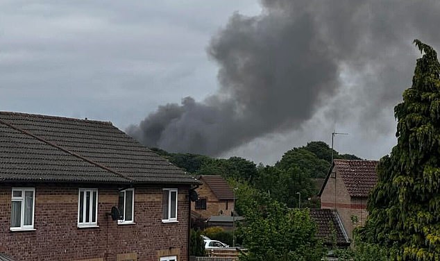 Bicester resident Janine McKenna Jones, 48, described seeing 'black ash' near her home following the fatal fire