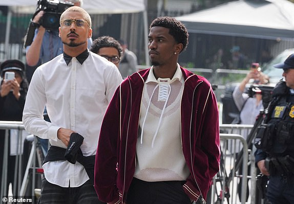 Quincy Brown and Christian Combs arrive at Federal court for the Sean "Diddy" Combs' sex trafficking and racketeering conspiracy trial at U.S. court in Manhattan, in New York City, U.S., May 16, 2025. REUTERS/David 'Dee' Delgado