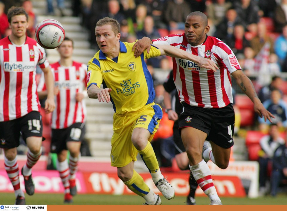 Soccer players vying for the ball.