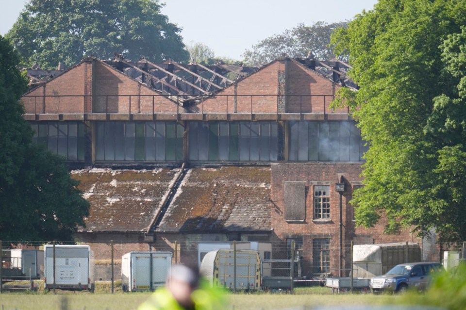 Damaged buildings following a fire at Bicester Motion, the site of a former RAF base which is home to more than 50 specialist businesses focused on classic car restoration and engineering in Oxfordshire, where a large fire broke out on Thursday, with witnesses reporting loud explosions and thick black smoke billowing from the site. Picture date: Friday May 16, 2025. PA Photo. See PA story FIRE Bicester. Photo credit should read: Andrew Matthews/PA Wire