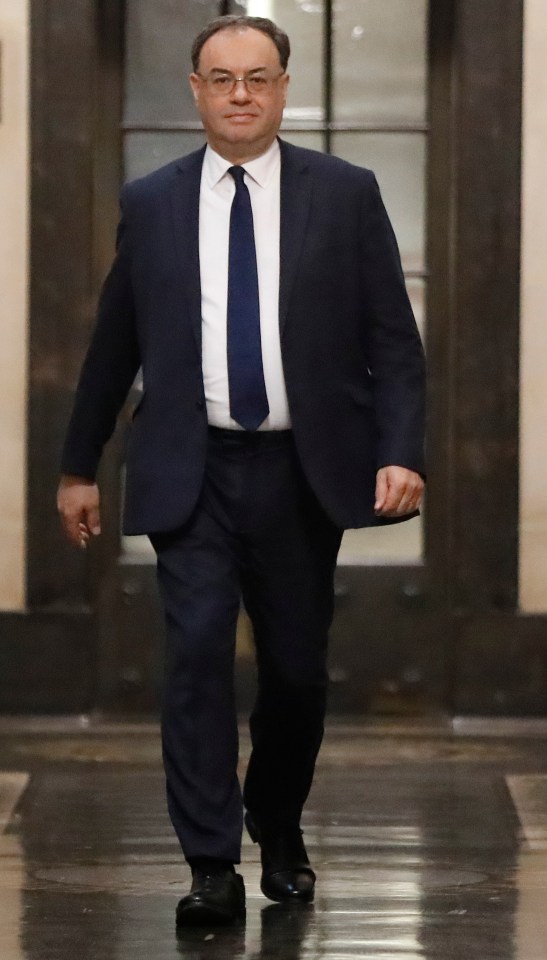 Andrew Bailey, Governor of the Bank of England, walking.