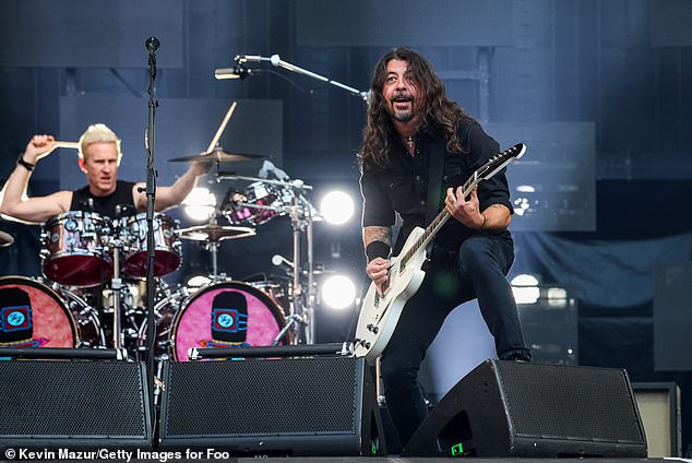 Drummer Josh Freese - pictured last year with Grohl - announced he had been abruptly sacked from the band in an Instagram post - following rumors he had been set to permanently replace the late Taylor Hawkins.