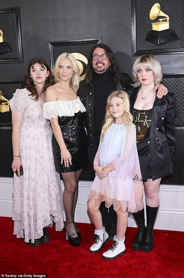 Freese's firing comes nearly eight months after Grohl welcomed a baby girl with rock fan Jennifer Young - he shares three older daughters — Violet, 18; Harper, 15; and Ophelia, 10 — with his wife, Jordyn Blum; seen with his family in 2023 in LA