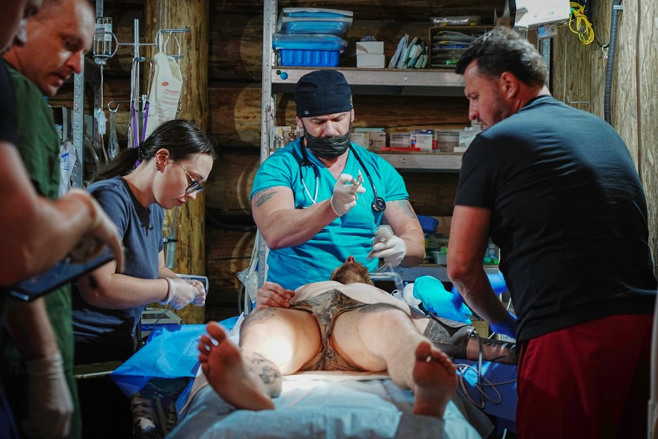 Medical personnel attending to a patient.