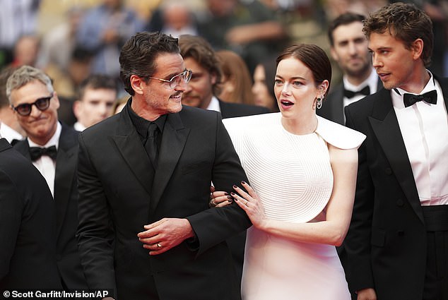 Pedro and Emma linked arms as they walked the carpet next to Austin