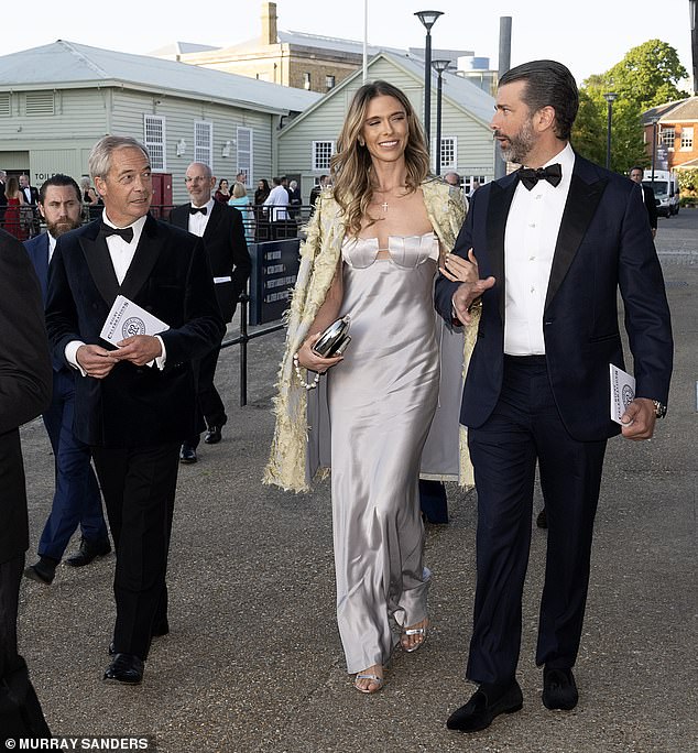 The beaming trio were there to celebrate gun makers John Rigby & Co 250th anniversary