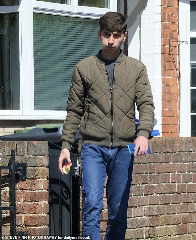 Ismail, 18, from Afghanistan, speaks no English and arrived in the UK across the Channel a few weeks ago. Pictured leaving his Grimsby HMO