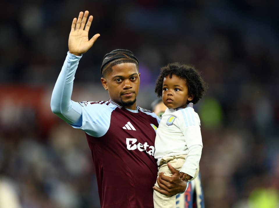 Leon Bailey of Aston Villa with his son.