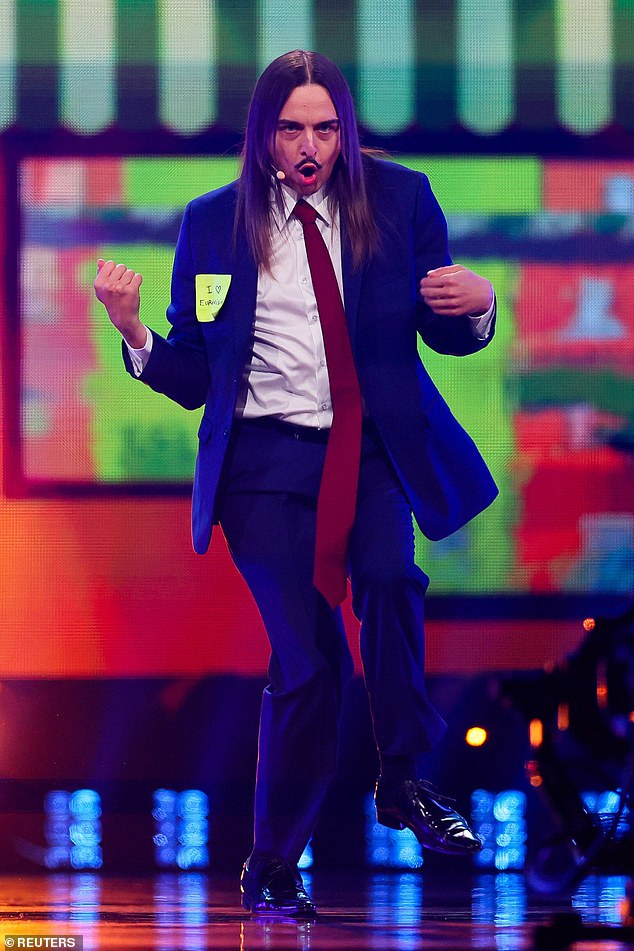 The song features exaggerated Italian phrases, references to the country's coffee culture and also pokes fun at its history with the mafia