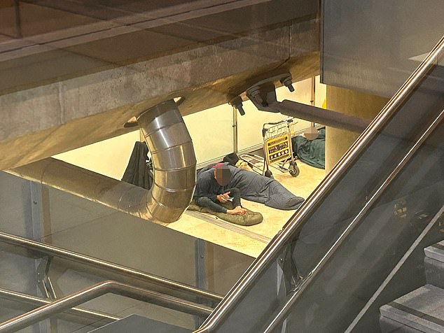 The occupants' lives are said to be made more difficult by authorities who have removed benches and electrical outlets, limiting their sleeping hours and bring in certain foods