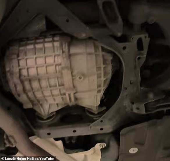 The ERAD (electric rear axle drive) system is meant to make the car more environmentally friendly - but has given many owners headaches (pictured: a YouTube video investigating a 'knocking' noise coming from the unit)