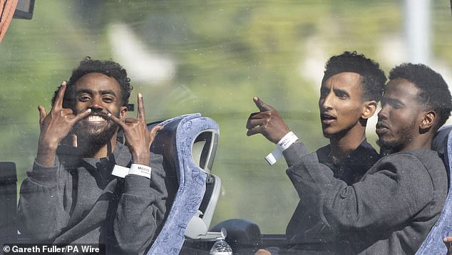 Last year saw net migration of 728,000 with more than 108,000 asylum claims - the highest number since records began. Pictured: People believed to be migrants leaving by bus in Dover, Kent