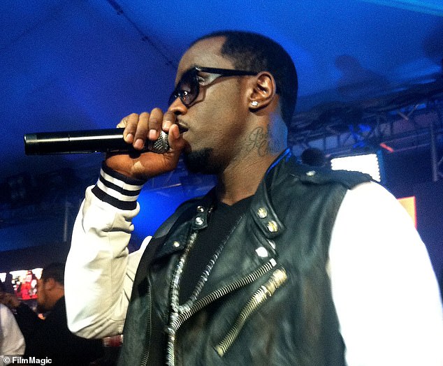 DailyMail.com has unearthed pictures of Diddy performing at the Fame At The Mansion Grammy Party at the Playboy Mansion that very evening