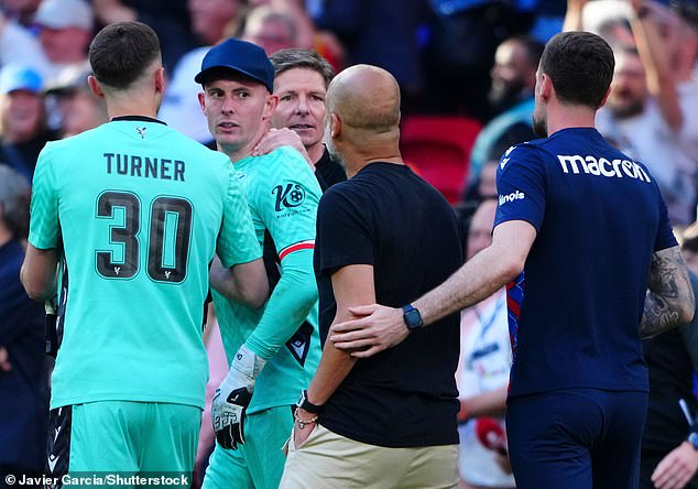 Henderson was eventually ushered away by Palace reserve goalkeeper Matt Turner (left)