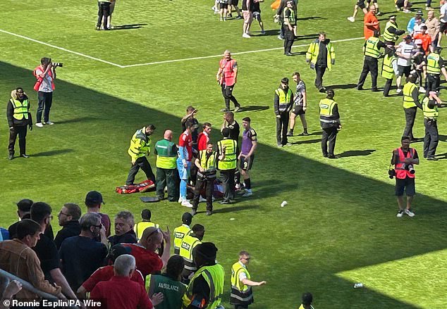 The unsavoury encounter came after Dundee United fans invaded the pitch after their victory