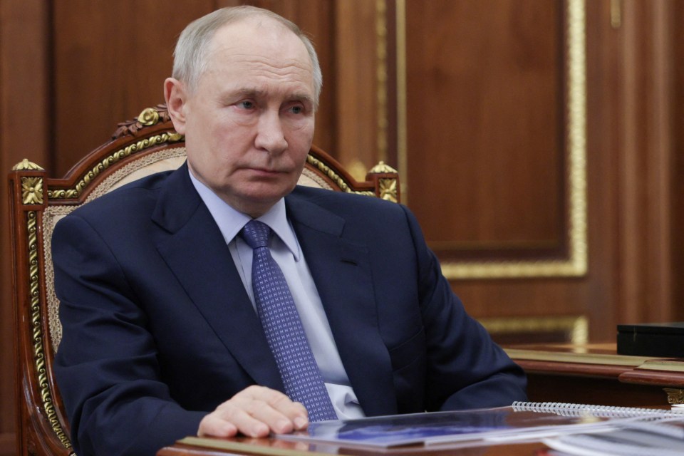 Vladimir Putin in a meeting.