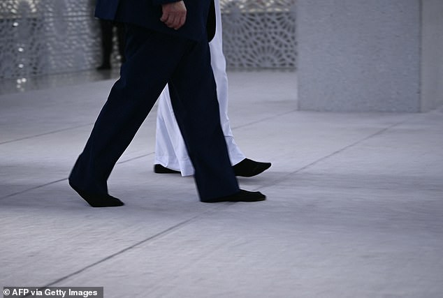 In both mosques, President Donald trump removed his shoes and sported only socks, as is culturally appropriate