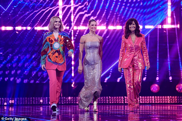 The model made a jaw-dropping entrance in Basel as she joined her co-hosts to present this year's grand finale