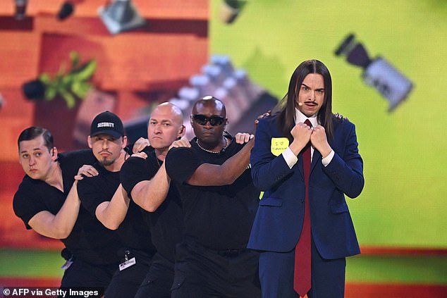 He fumed: 'We cannot allow a song that reinforces negative stereotypes about our country to compete in such a major international event. 'He [Tommy Cash] should come to Italy and see how decent people really work before daring to write such a stupid and stereotypical song.'