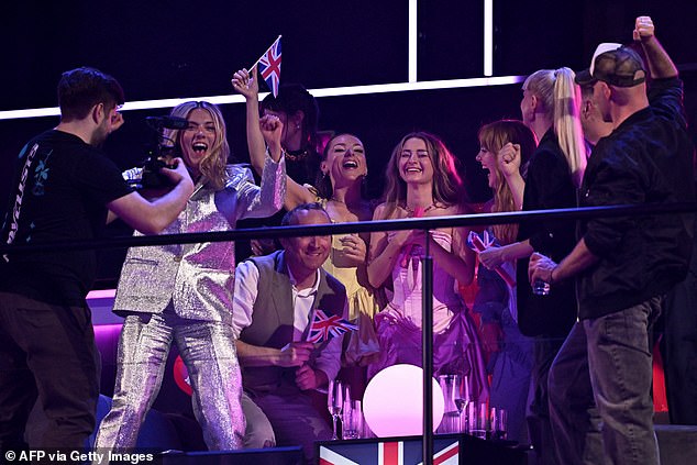 The group, made up of Lauren Byrne, Holly-Anne Hull and Charlotte Steele, all 30, react with glee as they received points in the public jury