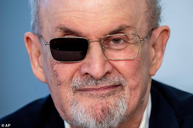 Author Salman Rushdie (pictured here at the Frankfurt Book Fair in 2023) was left blind in one eye after being stabbed onstage by an Islamic extremist as he was about to deliver a public lecture in August 2022