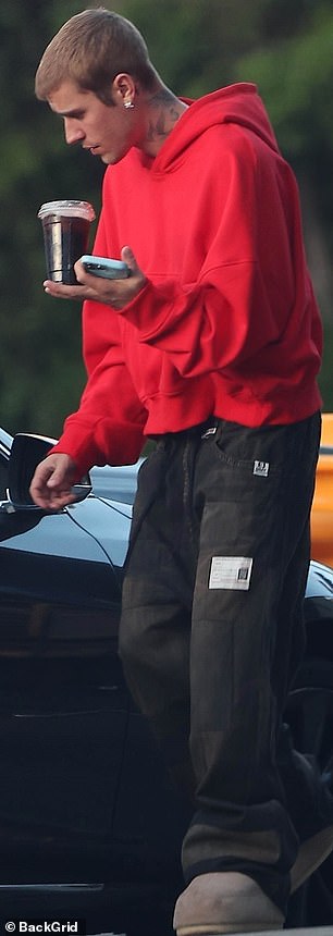 He wore a large set of shoes that resembled bedroom slippers