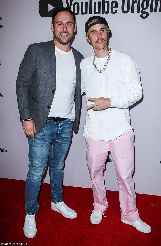 A source told the Daily Mail that Justin's former manager Scooter Braun 'has given Justin much grace because he cares deeply for him, but for Justin to continue going on like he has been taken advantage of is disgraceful'