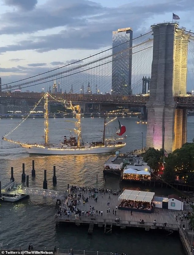 The ship's mast was seen snapping backwards as the boat continued to drift under the bridge