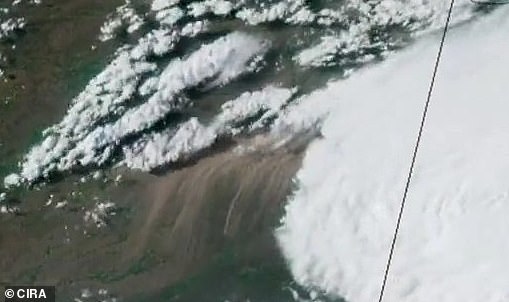 Satellite footage revealed how the enormous 100-mile long dust cloud sweeping across the area was visible from space