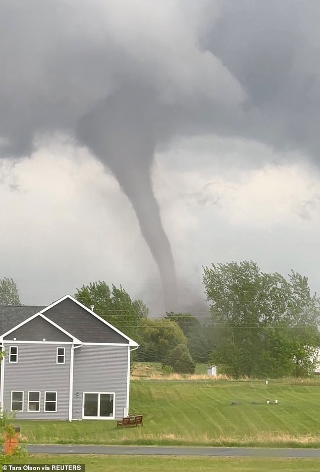 Faith Borden, a meteorologist with the National Weather Service, said that middle Tennessee could expect 'all types of weather. Winds up to 70 mpg. Were talking seriously large hail up to 3 inches, which for us is big hail' Pictured: A tornado in New Richmond, Wisconsin