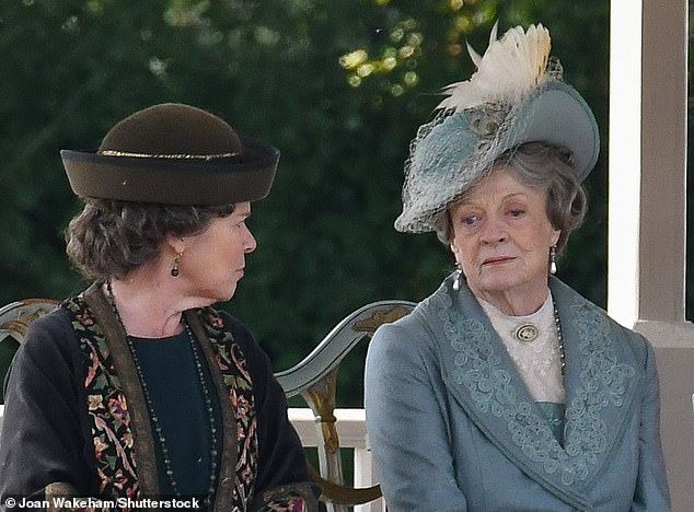 'If safety is taken as seriously as airlines claim, why give us such critical information via a lame parody of Downton Abbey?' Pictured: Imelda Staunton and Dame Maggie Smith on the set of Downton Abbey The Movie