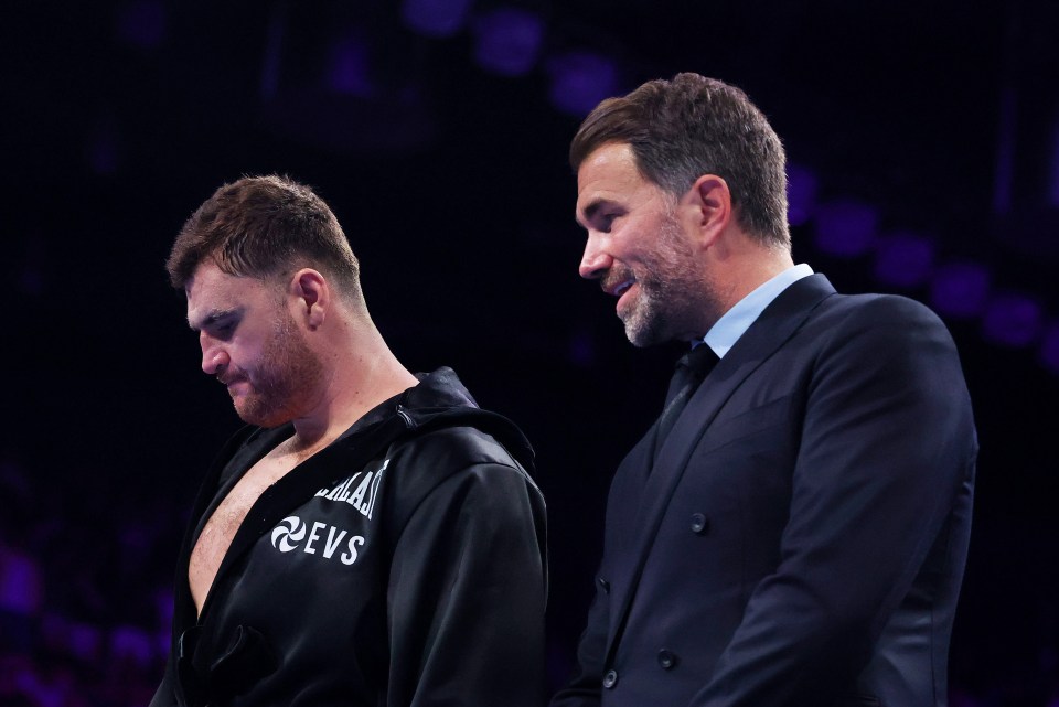 LONDON, ENGLAND - MAY 17: Johnny Fisher looks on alongside Eddie Hearn, Chairman of Matchroom Sport and Professional Darts Corporation, prior to Heavyweight fight between Johnny Fisher and Dave Allen as part of the Johnny Fisher v Dave Allen 2 - Fight Night at Copper Box Arena on May 17, 2025 in London, England. (Photo by Richard Pelham/Getty Images)
