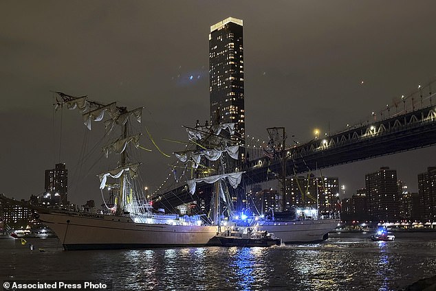 A masted Mexican Navy training ship, the Cuauhtémoc, sits stranded after colliding with the Brooklyn Bridge in New York on Saturday