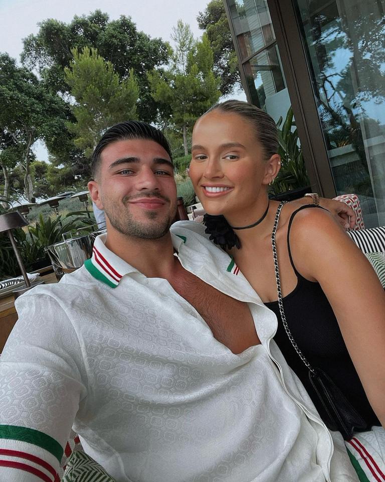 Photo of Tommy Fury and Molly-Mae Hague embracing.