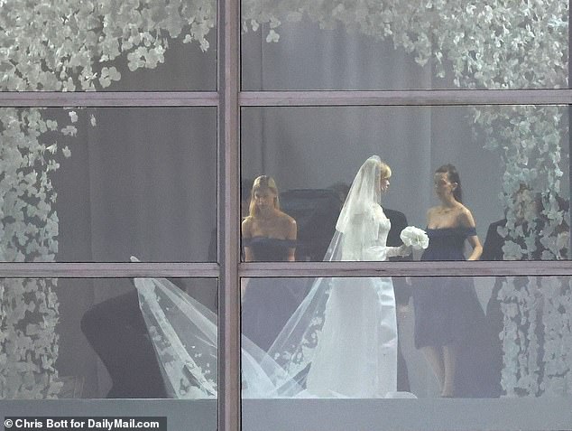 Rumours of a feud were sparked on the wedding day itself, when Nicola opted to wear a Versace bridal gown (pictured) instead of one of Victoria's designs