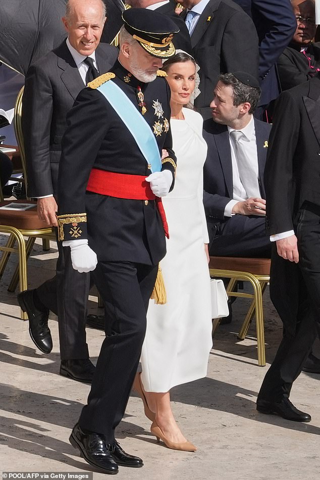 The Spanish Queen matched her white ensemble with a pair of simple yet classic nude kitten heels