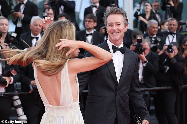 Shauna, who married Edward in 2012, opted for a plunging cream gown with a delicate floral print surrounding the skirt