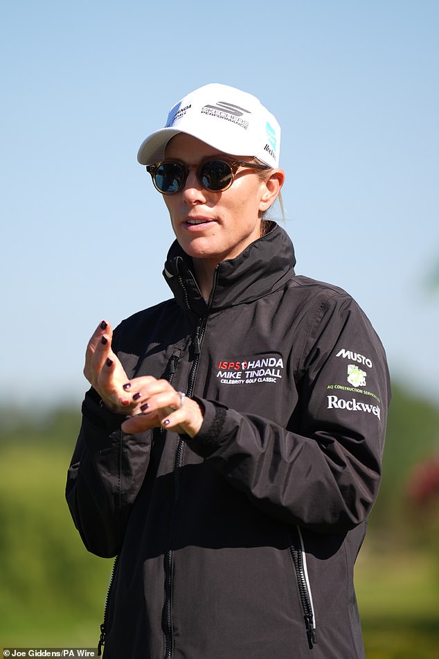Zara looked typically stylish in her black sport jacket, white shorts, and a white golf cap. She accessorised with her engagement ring and a pair of brown sunglasses