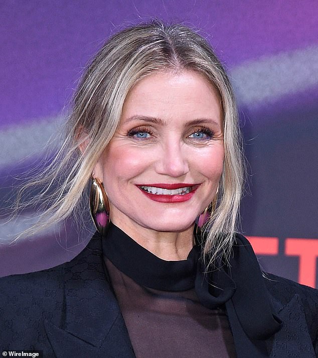 Debate over who the mystery woman is led to a theory that it could be Cameron Diaz, who voiced Princess Fiona in the film, but it appeared to have been debunked following higher resolutions of the image