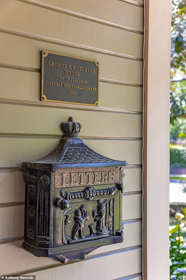 Vintage mailbox and doorbell maintain the home's turn-of-the-century charm