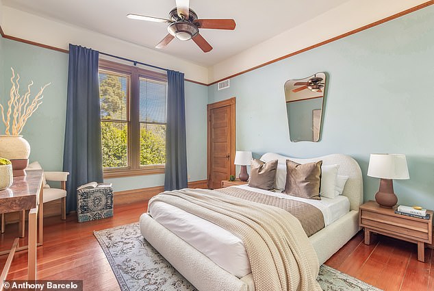 Cozy guest bedroom accented with light blue details