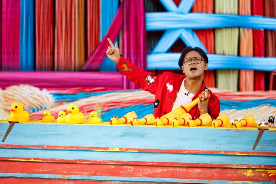 Papi performing on Britain's Got Talent with rubber ducks and chickens.