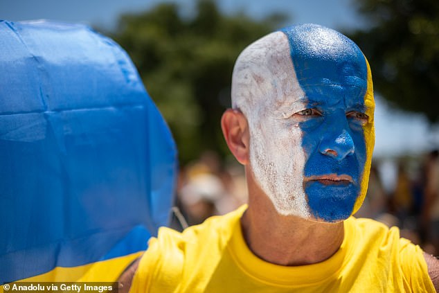 Protestors painted their faces and wore matching yellow t-shirts at the protests