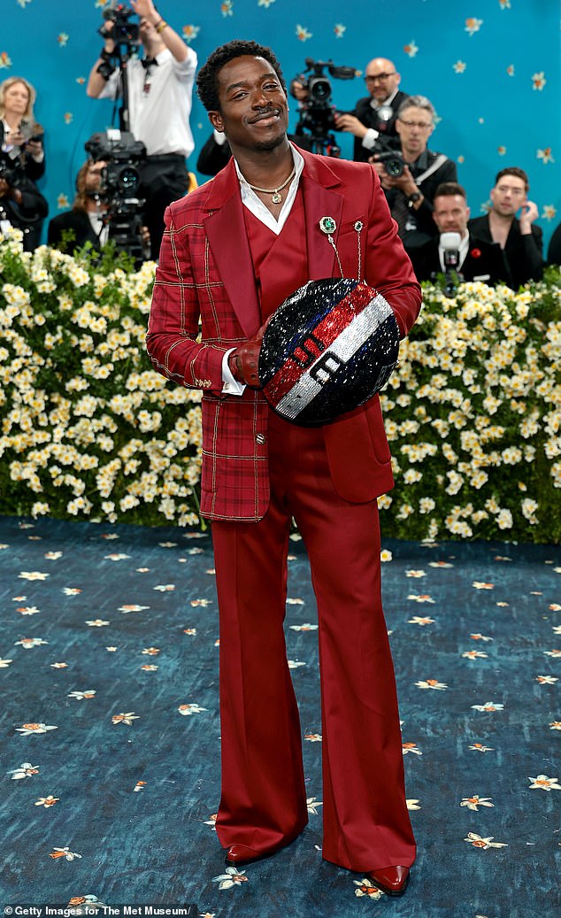 One of her favorite looks like this year was Damson Idris (pictured on the carpet). The young woman said 'blessings and hard work' got her to where she is. Hewitt has been hustling since her teens for moments like this and has shot five different Met Galas