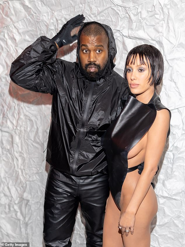 Locals have said people were 'left horrified' as the couple walked through the market in the revealing ensemble