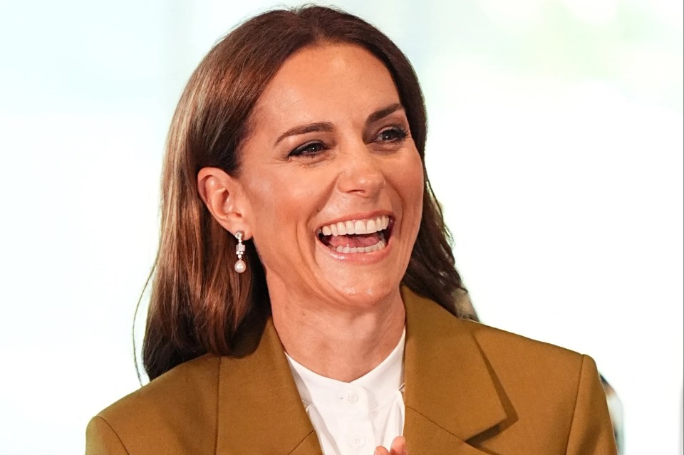 The Princess of Wales laughing at a British Fashion Council event.