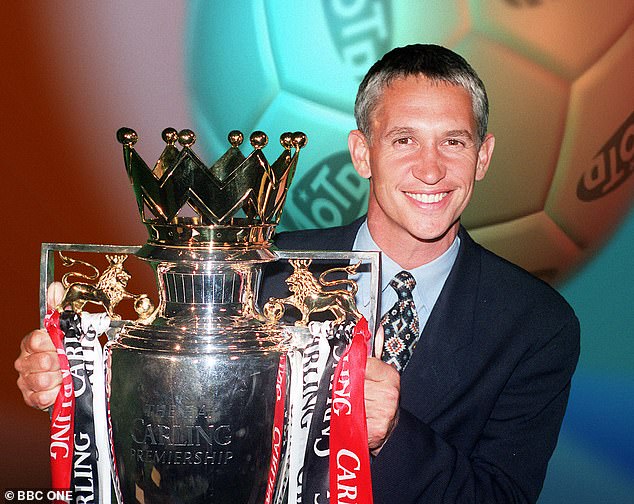 Lineker poses with the Premier League trophy shortly before starting his stint as presenter of Match of the Day in 1999